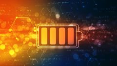 Dieses Bild zeigt ein Batterieversorgungs-Symbol vor einem digitalen Hintergrund.